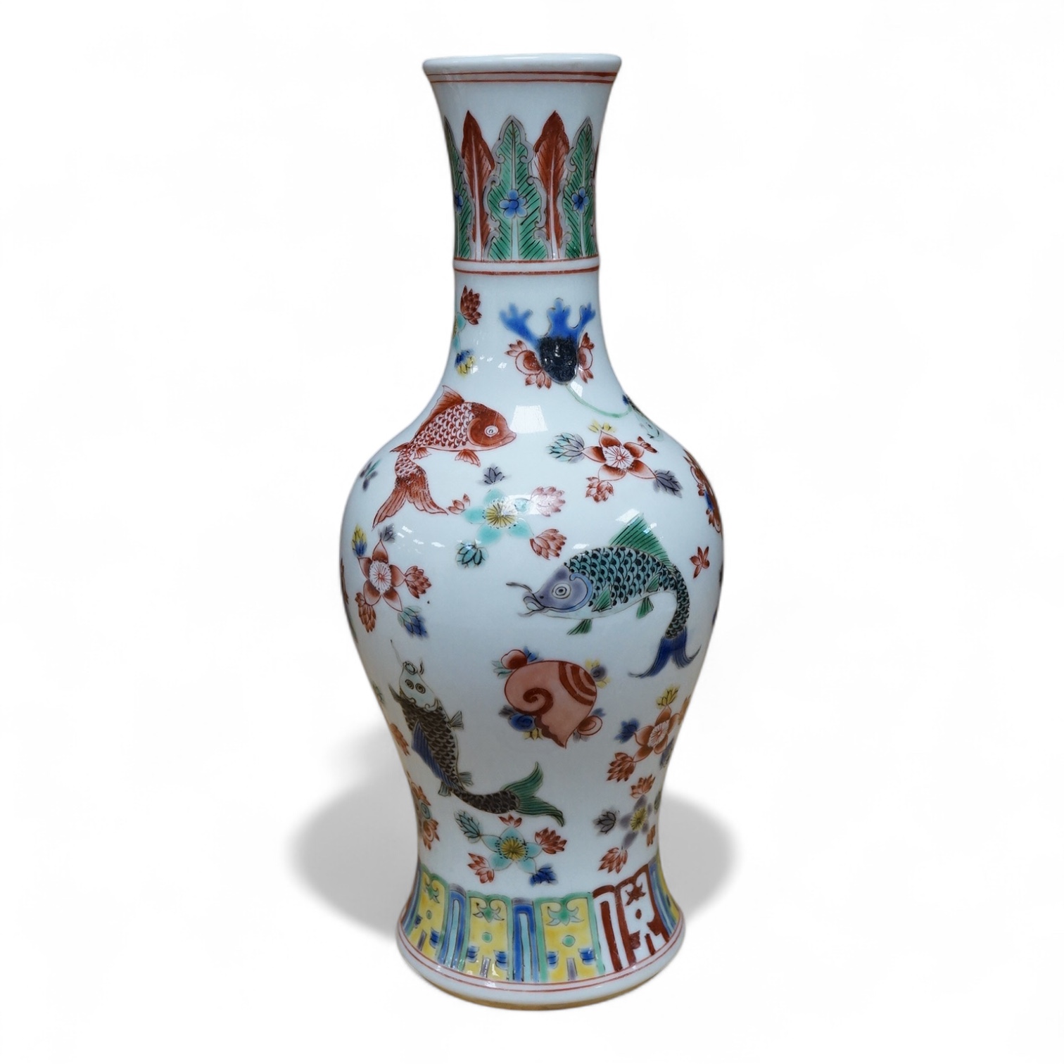 A Chinese wucai ‘fish and flower’ vase, 26cm